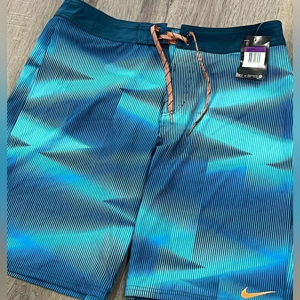 NWT Nike 32W Blue Drawstring Unlined Swim Trunks Blue Stripe Pattern